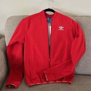 Adidas jacket in red with white details